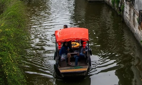 black-awning boat-fengjing ancient town
